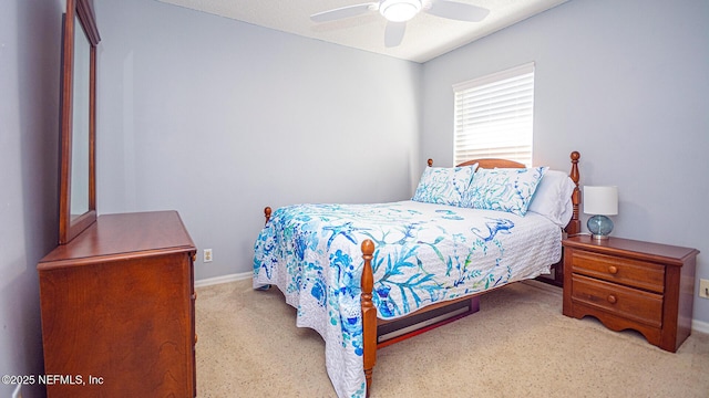 bedroom featuring ceiling fan and baseboards