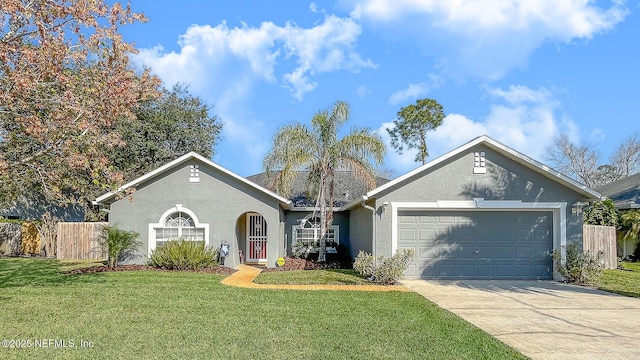 ranch-style house with driveway, an attached garage, fence, a front lawn, and stucco siding