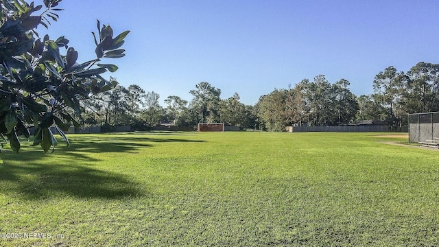 view of yard featuring fence