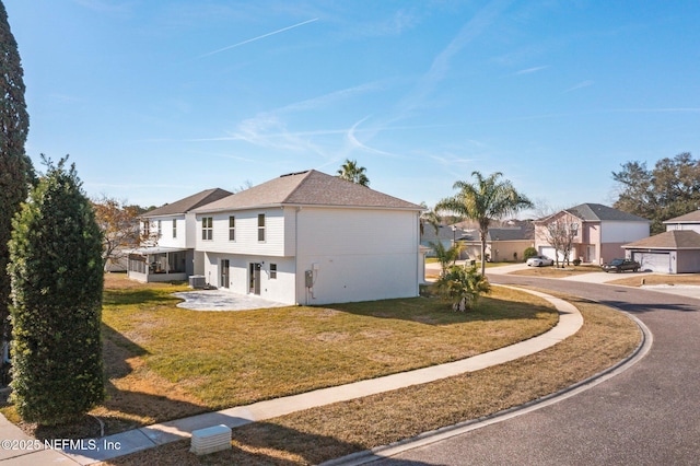 view of front of property with a front lawn