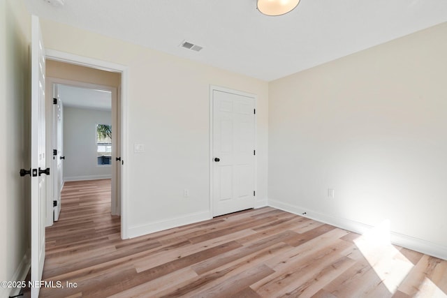 unfurnished bedroom with light hardwood / wood-style flooring