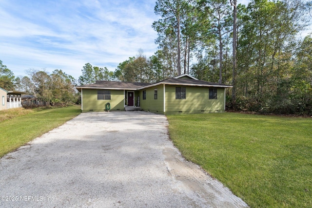 single story home featuring a front yard