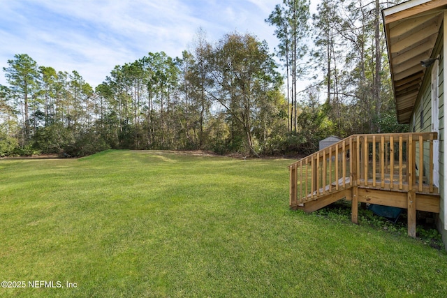 view of yard with a deck