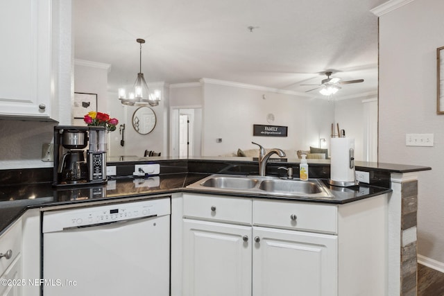 kitchen featuring ceiling fan with notable chandelier, white cabinetry, dishwasher, sink, and crown molding