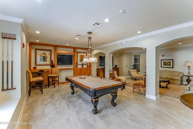 game room with crown molding and pool table