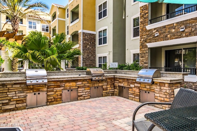 view of patio featuring area for grilling and grilling area