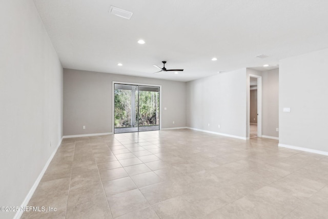 unfurnished room featuring light tile patterned floors and ceiling fan