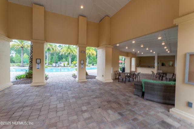 view of patio / terrace featuring a community pool