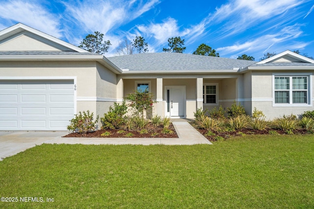 ranch-style home featuring a garage and a front lawn