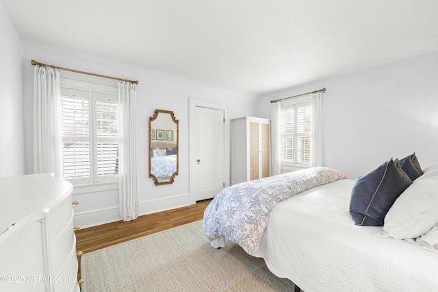 bedroom featuring hardwood / wood-style flooring