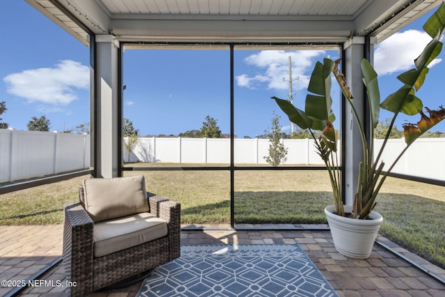 sunroom / solarium with a wealth of natural light