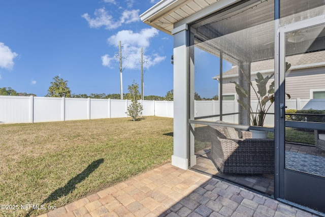 exterior space featuring a fenced backyard and a patio