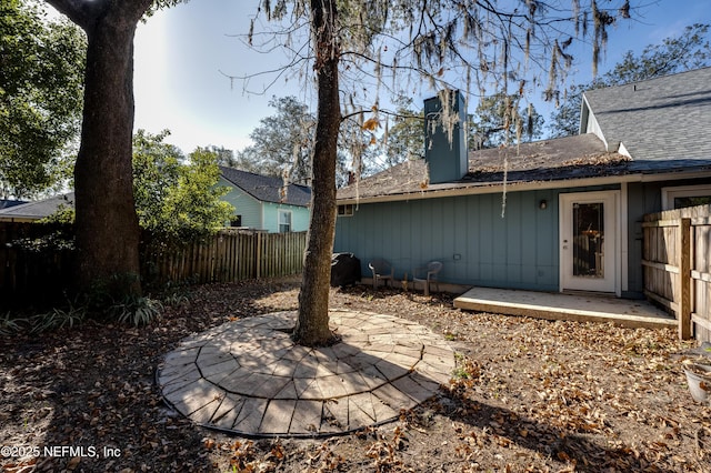 back of house with a patio area