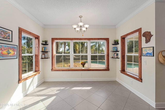 unfurnished dining area featuring an inviting chandelier, light tile patterned floors, crown molding, and a textured ceiling