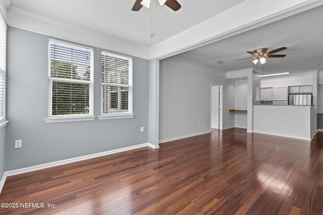 interior space featuring crown molding, ceiling fan, and dark hardwood / wood-style flooring