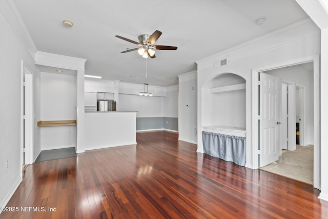 unfurnished living room with ornamental molding, dark hardwood / wood-style floors, and ceiling fan