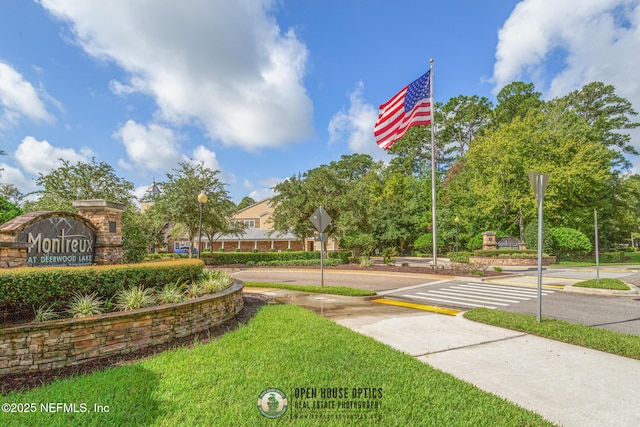 surrounding community featuring a yard