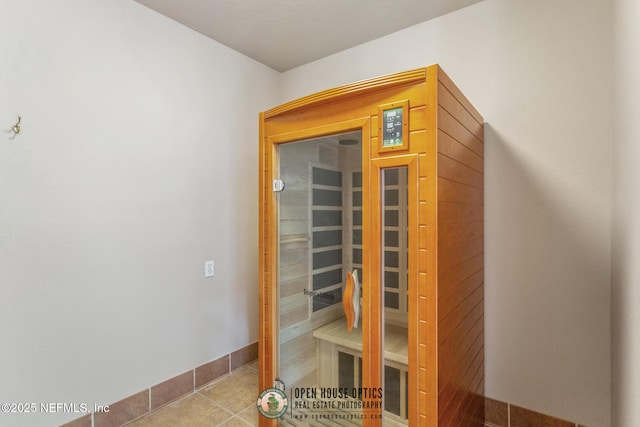 view of sauna featuring tile patterned floors