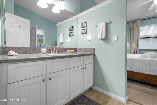 bathroom featuring vanity and hardwood / wood-style floors