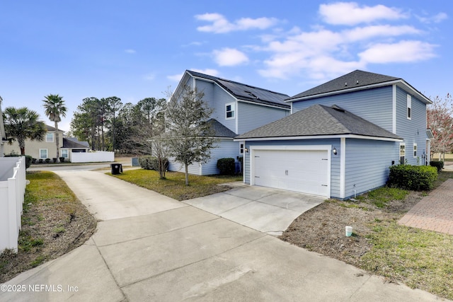 view of property exterior with a garage