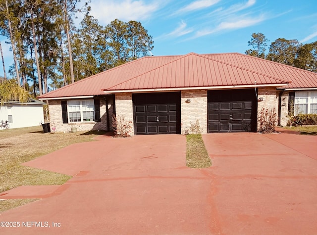 ranch-style house featuring a garage