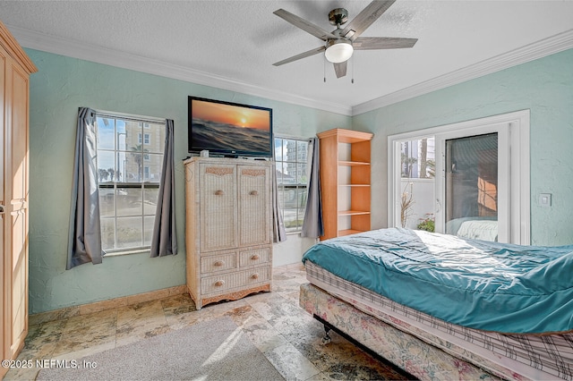 bedroom featuring ornamental molding, ceiling fan, and a textured ceiling