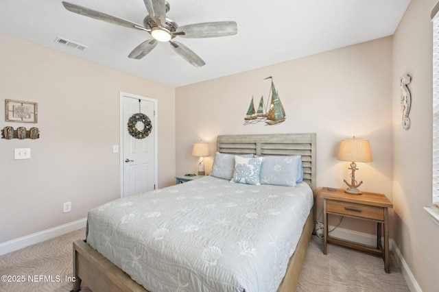 bedroom with light colored carpet and ceiling fan