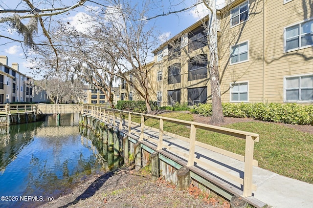 view of home's community featuring a water view