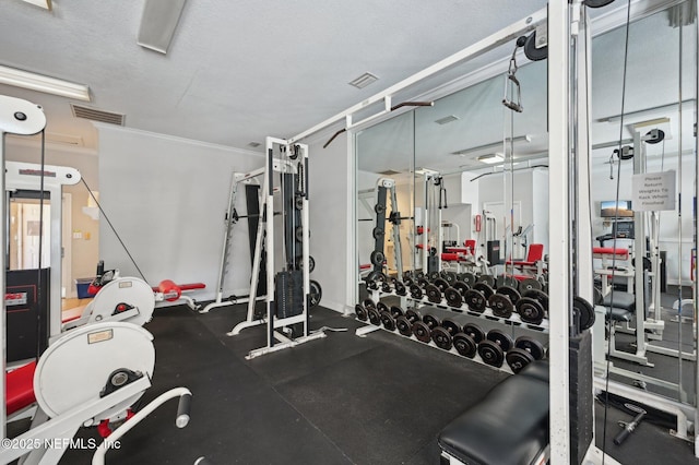 gym featuring ornamental molding