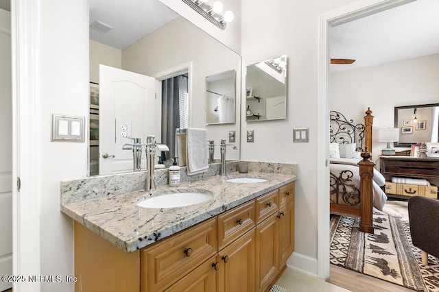 bathroom featuring vanity and tile patterned floors