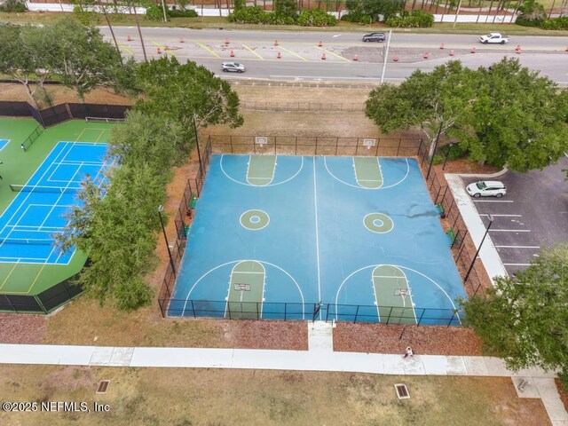 view of basketball court with tennis court