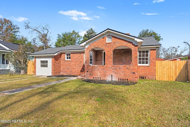 view of front of property with a front lawn