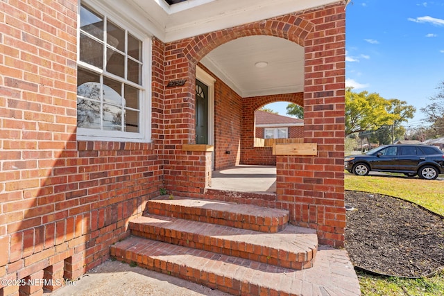 doorway to property with covered porch