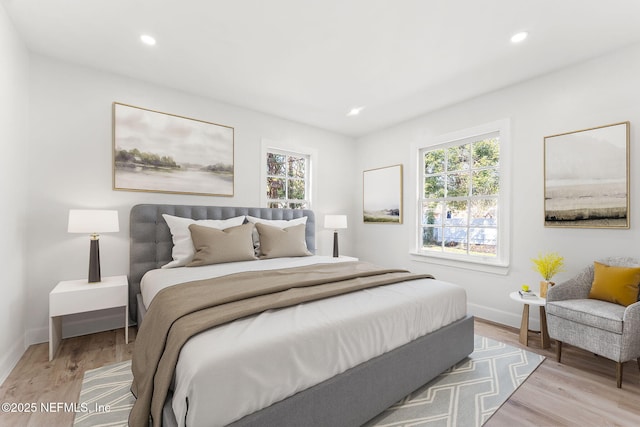 bedroom featuring light wood-type flooring