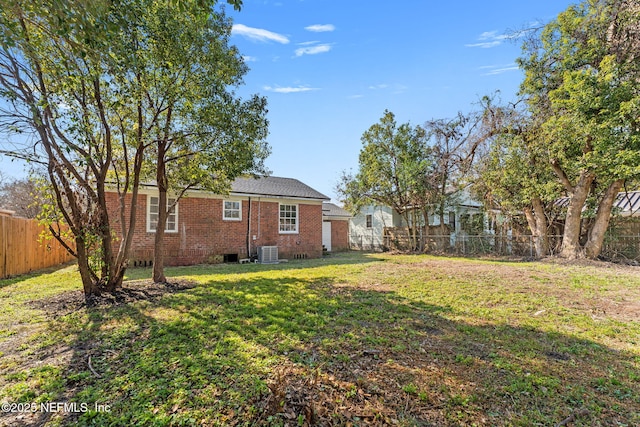 view of yard with central AC