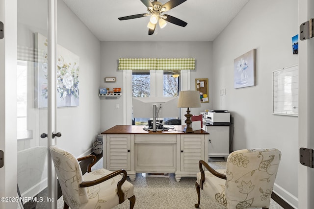 office featuring ceiling fan and french doors