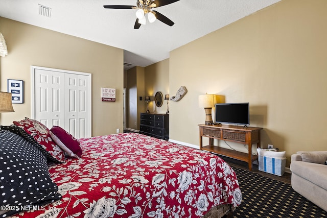 bedroom featuring a closet and ceiling fan