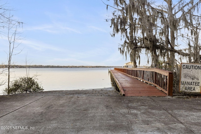 dock area featuring a water view