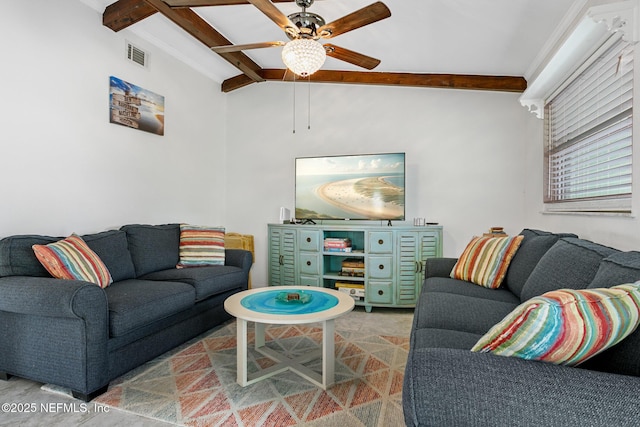 living room featuring ceiling fan and beam ceiling