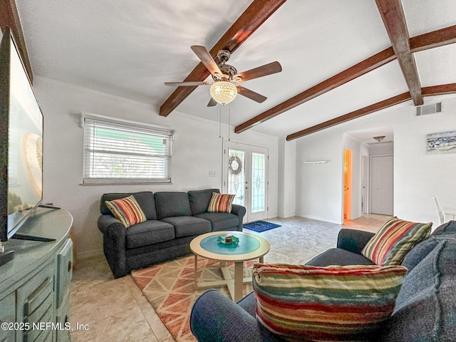 tiled living room with lofted ceiling with beams and ceiling fan