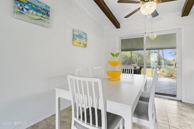 dining space featuring ceiling fan, beam ceiling, and light tile patterned floors