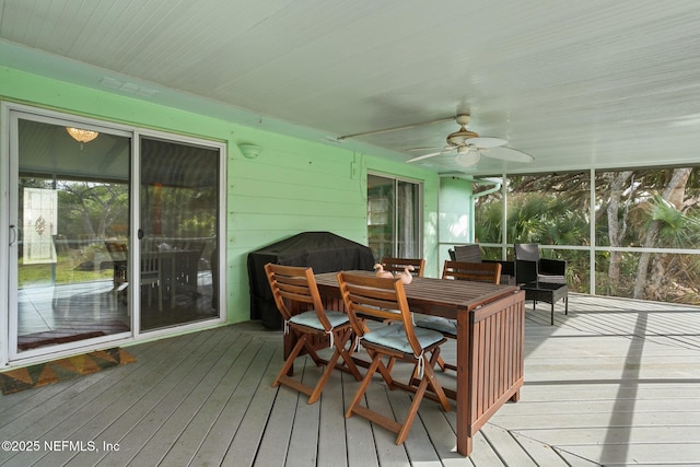 sunroom / solarium with ceiling fan