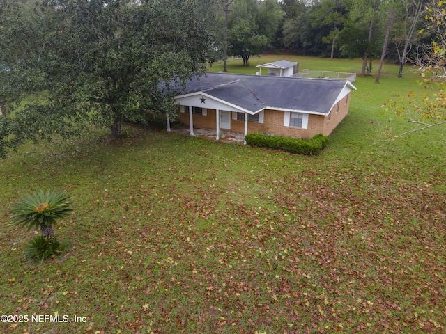 exterior space featuring a front lawn