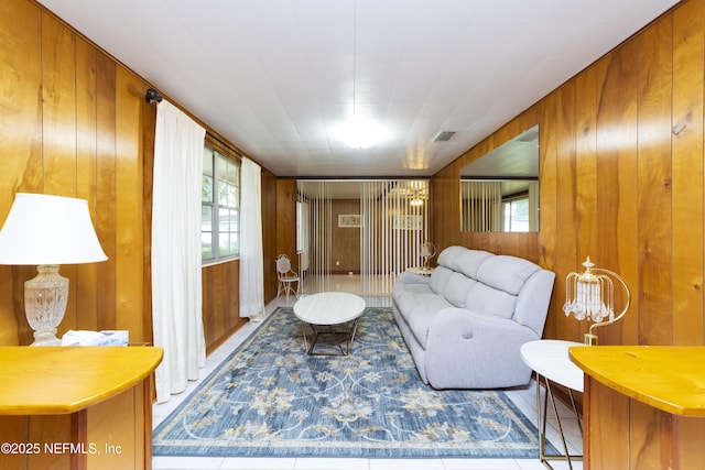 living room with wooden walls