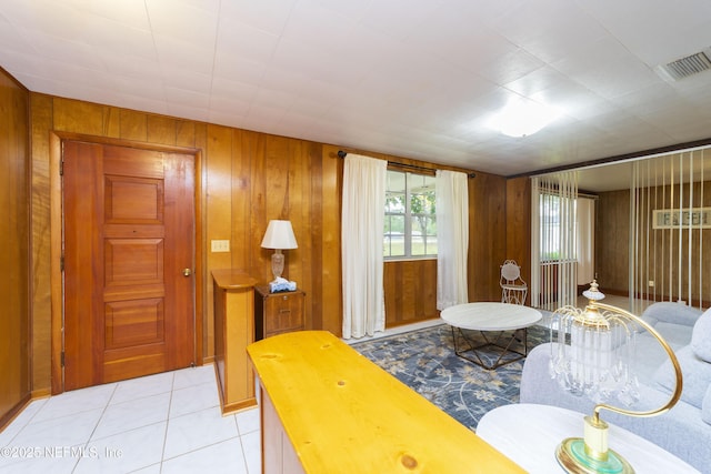 interior space featuring wooden walls