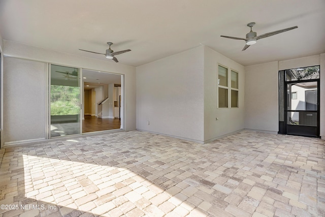 view of patio / terrace featuring ceiling fan