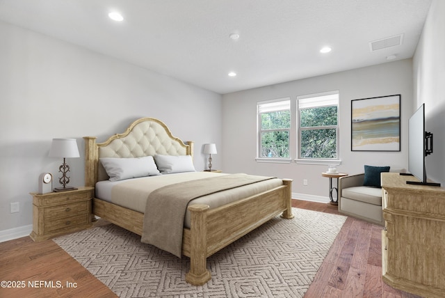 bedroom featuring light wood-type flooring