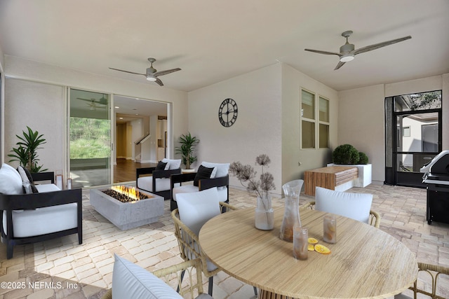 dining area with ceiling fan