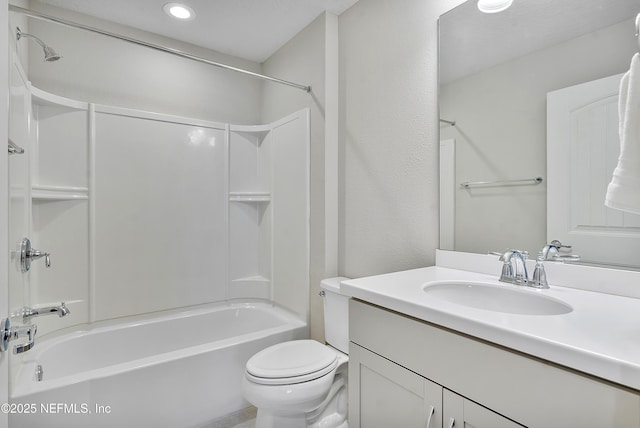 full bathroom featuring vanity, shower / tub combination, and toilet