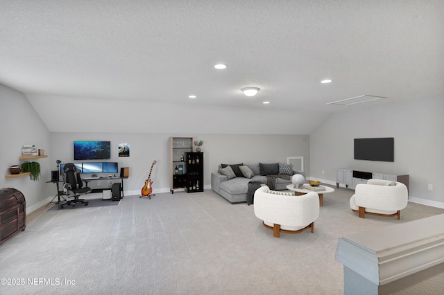 living room with lofted ceiling, light colored carpet, and a textured ceiling